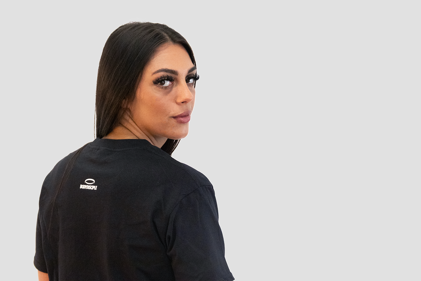 Black durable gym tee for women from BodyDisciple with a stylish design and comfortable fit