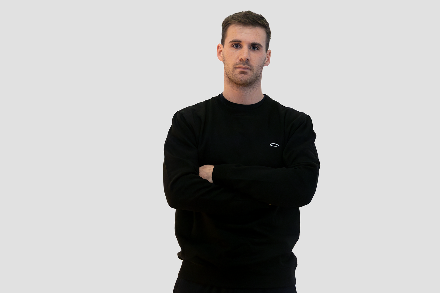 Men's black sweatshirt by Bodydisciple featuring a classic design and comfortable fit