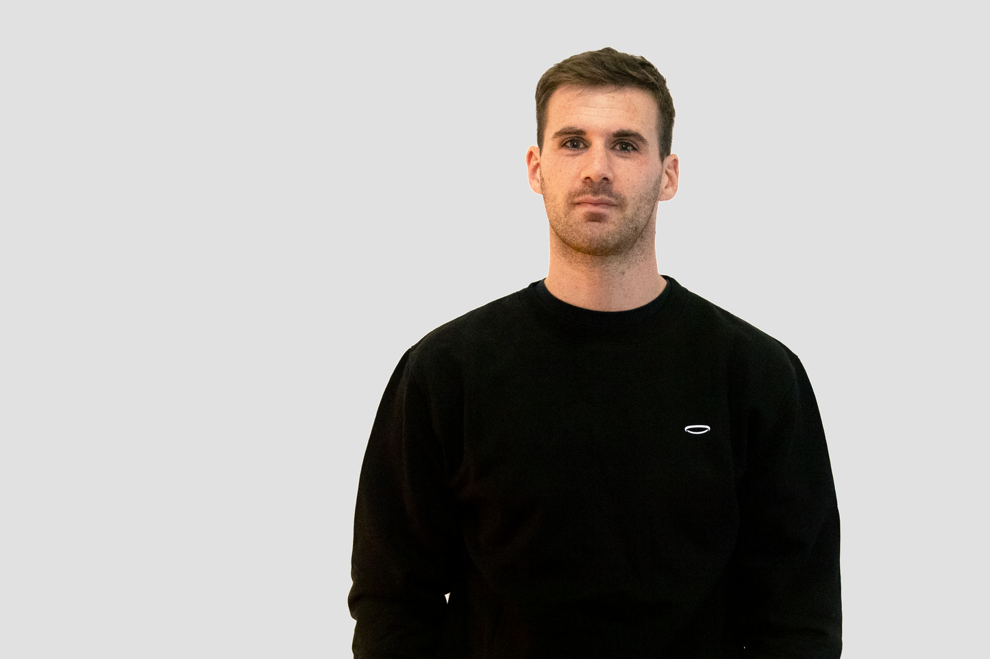 Men's black sweatshirt by Bodydisciple, perfect for workouts and casual wear