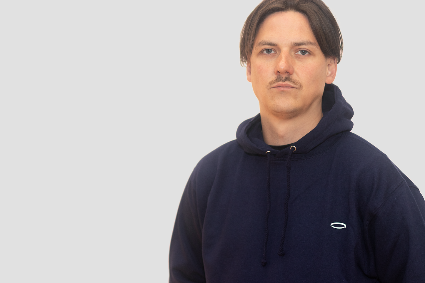 Men's navy hoodie from BodyDisciple, featuring a comfortable and stylish design for active wear
