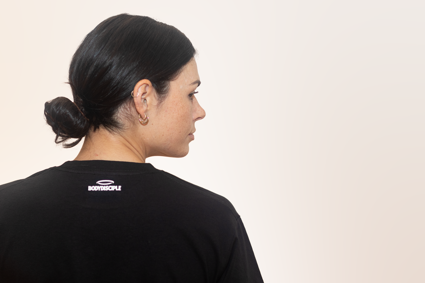 Back view of Women's Black Halo Tee from BodyDisciple featuring a stylish and comfortable design