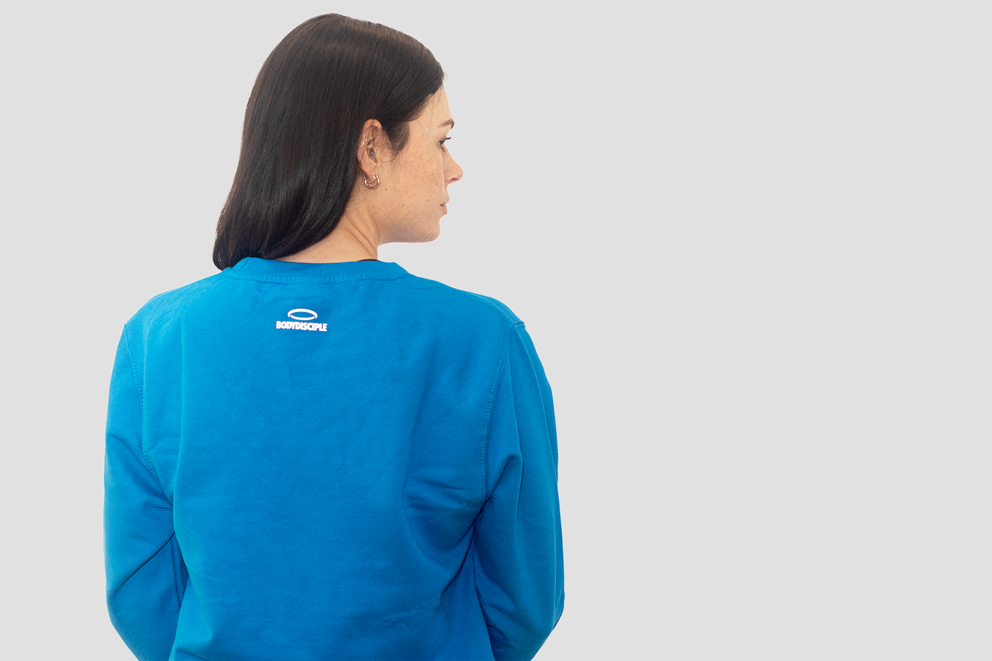 Women’s sapphire sports sweatshirt in blue, featuring a stylish back design from BodyDisciple