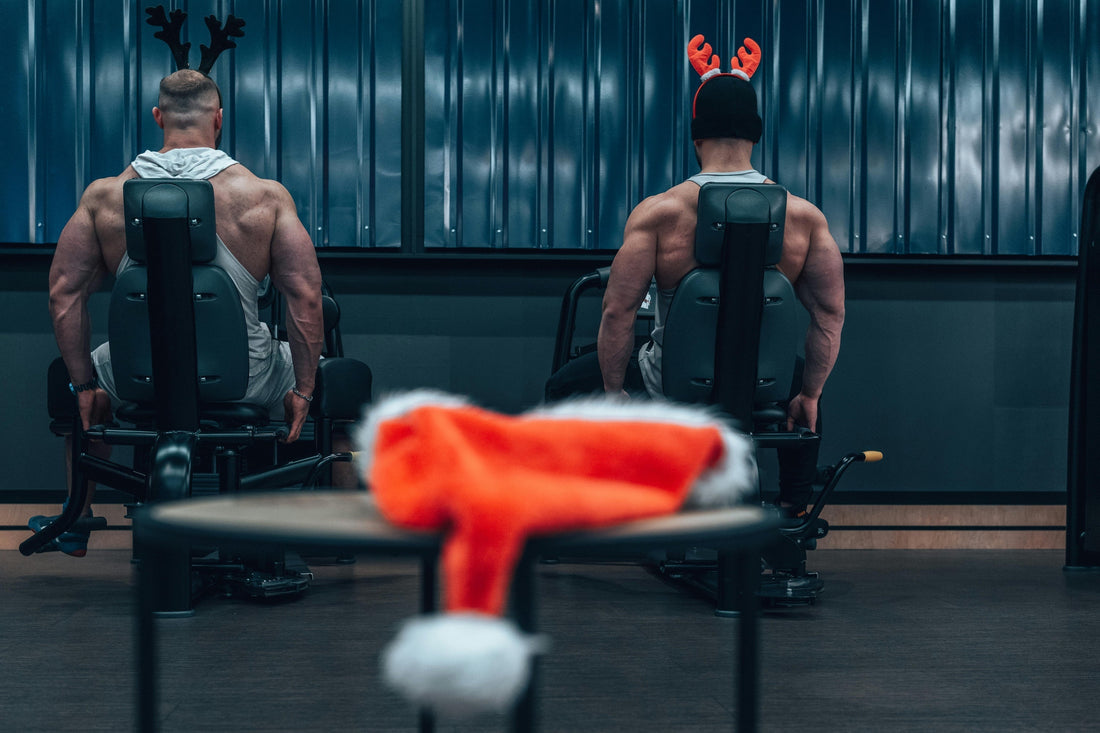 Two men working out in holiday attire, illustrating how to stay fit during Christmas holidays