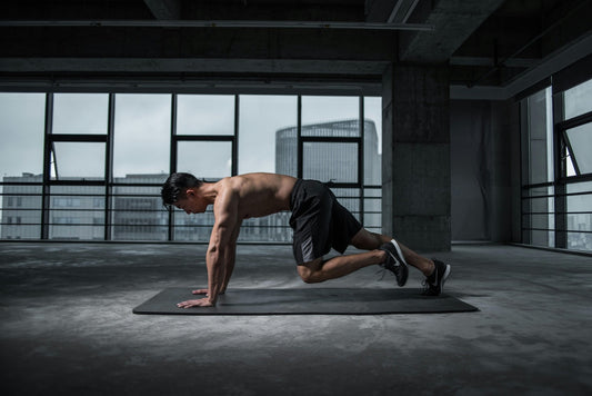 A man working out showing how to stay motivated and positive in the gym.