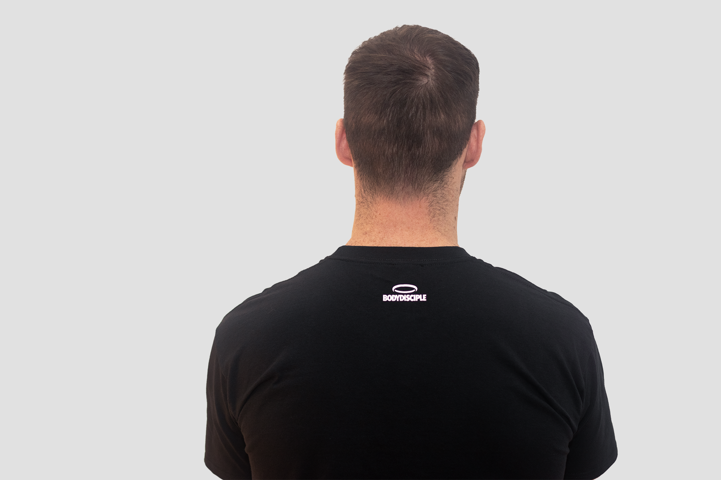 Back view of Big Halo athletic shirt for men by BodyDisciple in black color