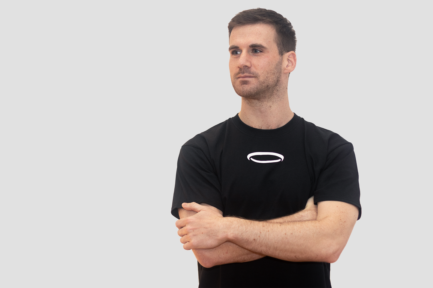 Men's Big Halo athletic shirt from BodyDisciple in black with a stylish logo on the chest
