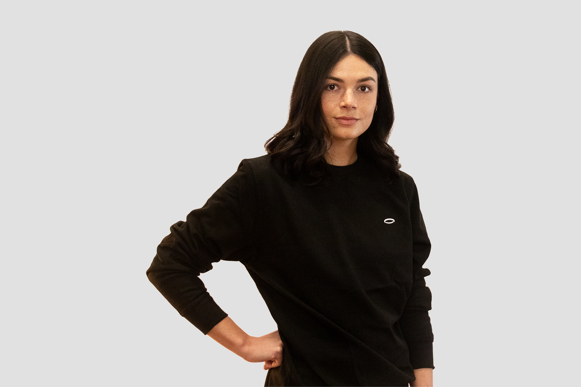 Stylish women's black sweatshirt from BodyDisciple featuring a relaxed fit and sleek design